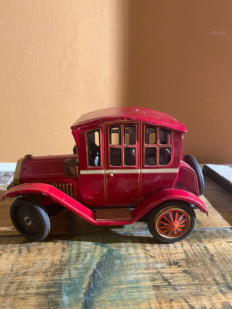 Vintage tin lithographed battery operated car